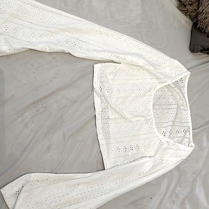 This is a shein white cropped flared arm top.